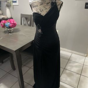 Black evening gown , one-sleeve with beaded detailing. Size 6, stretchy fabric